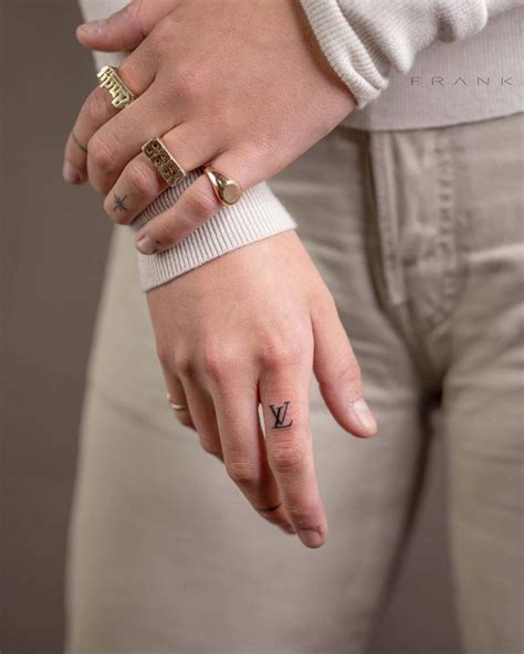 lv finger tattoos|Louis vuitton finger tattoo .